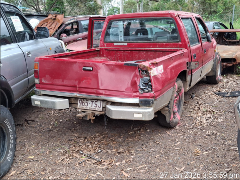 Impounded Red Holden Rodeo