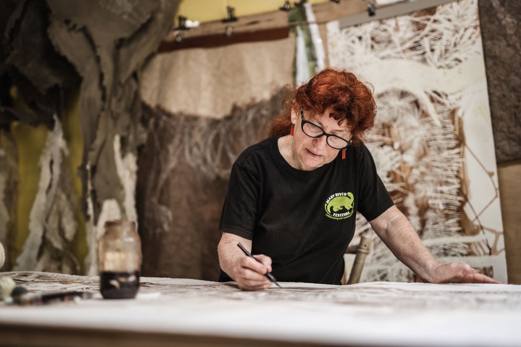 Artist joolie gibbs in her studio